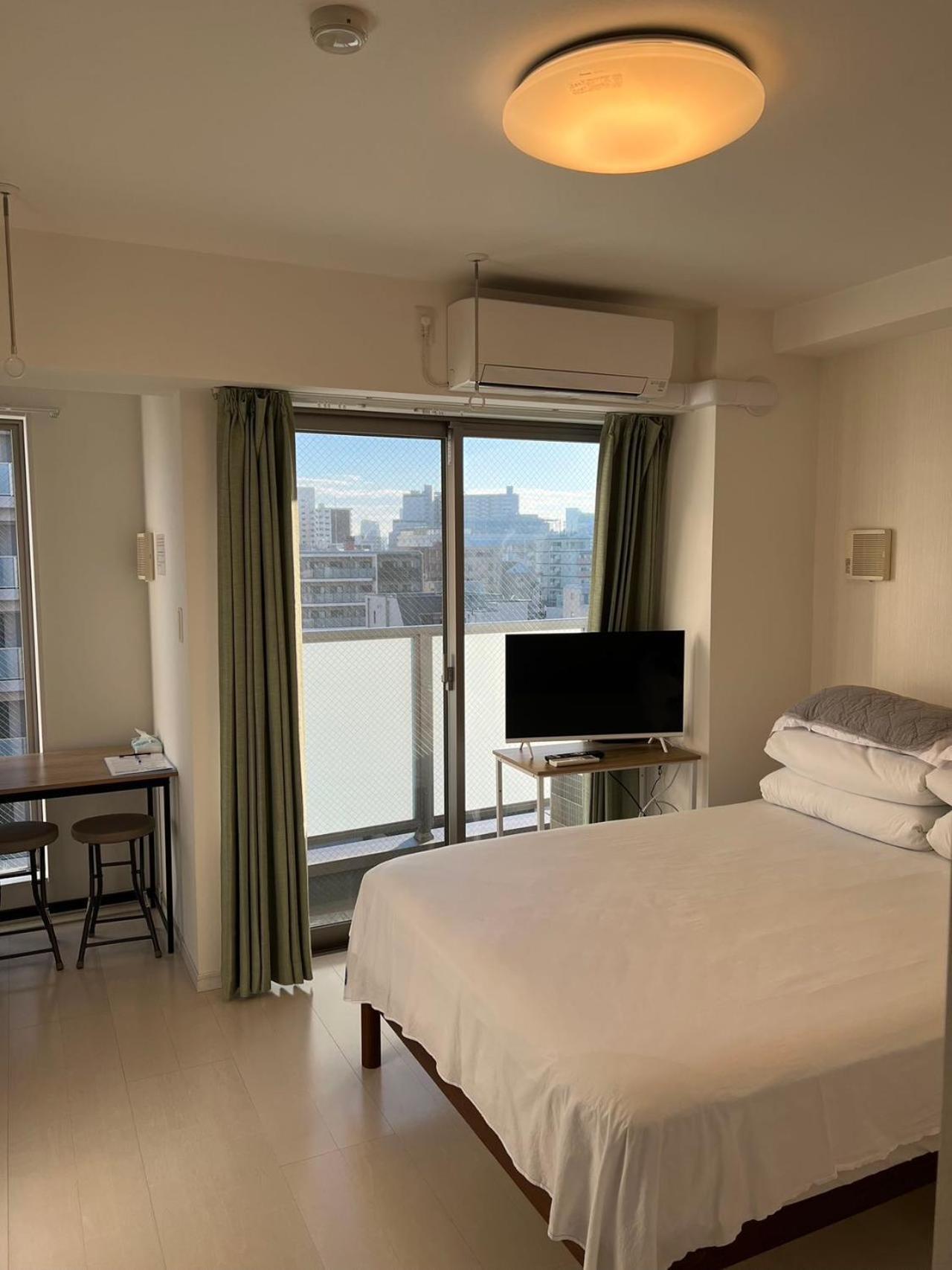 Skyhotel Kikukawa 駅徒歩2分 Tokio Buitenkant foto